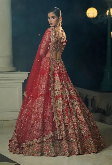 Sindoor Crimson Raw Silk Handcrafted Bridal Lehenga drape angle